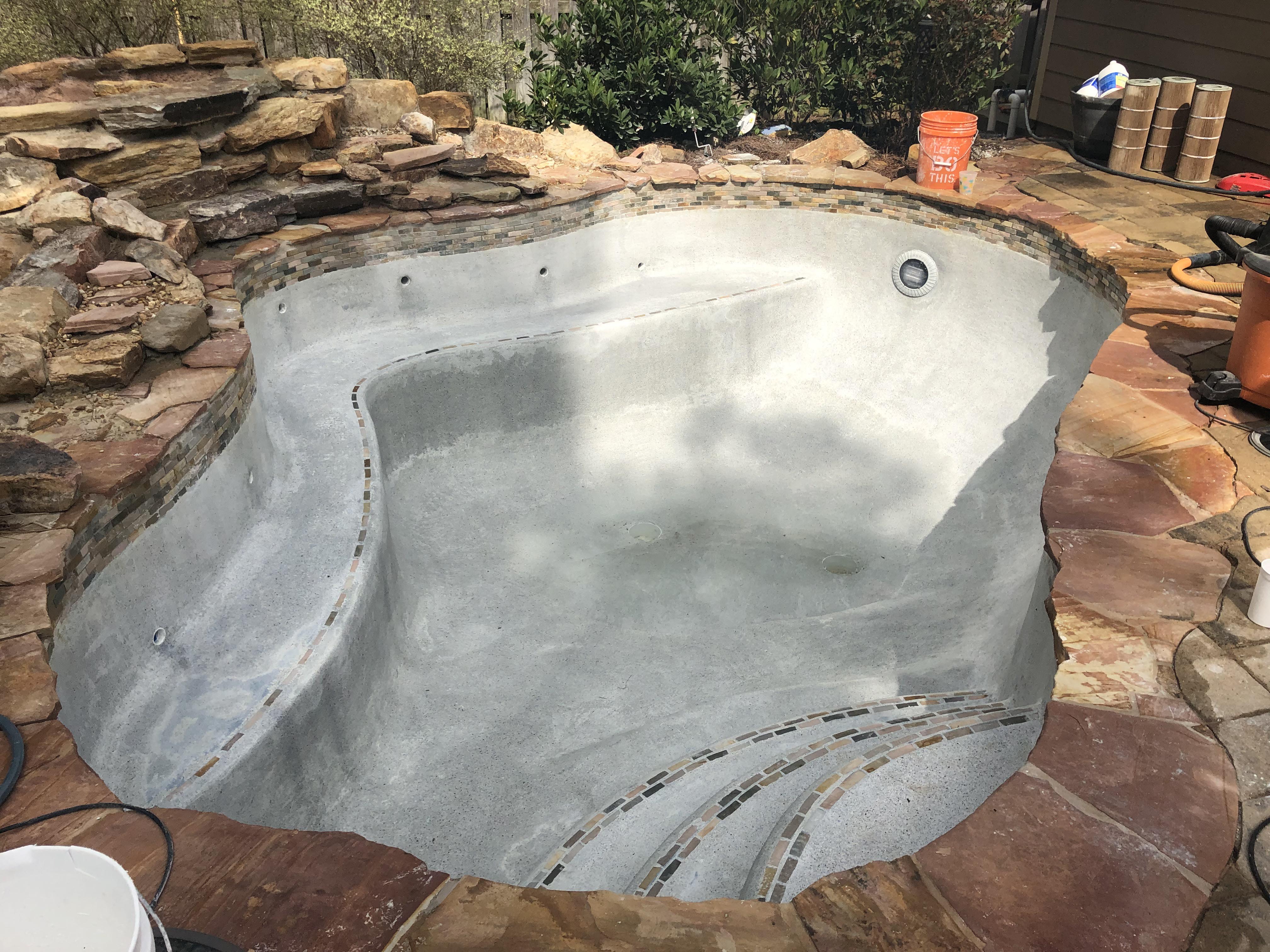 Drained pool to better show inlets